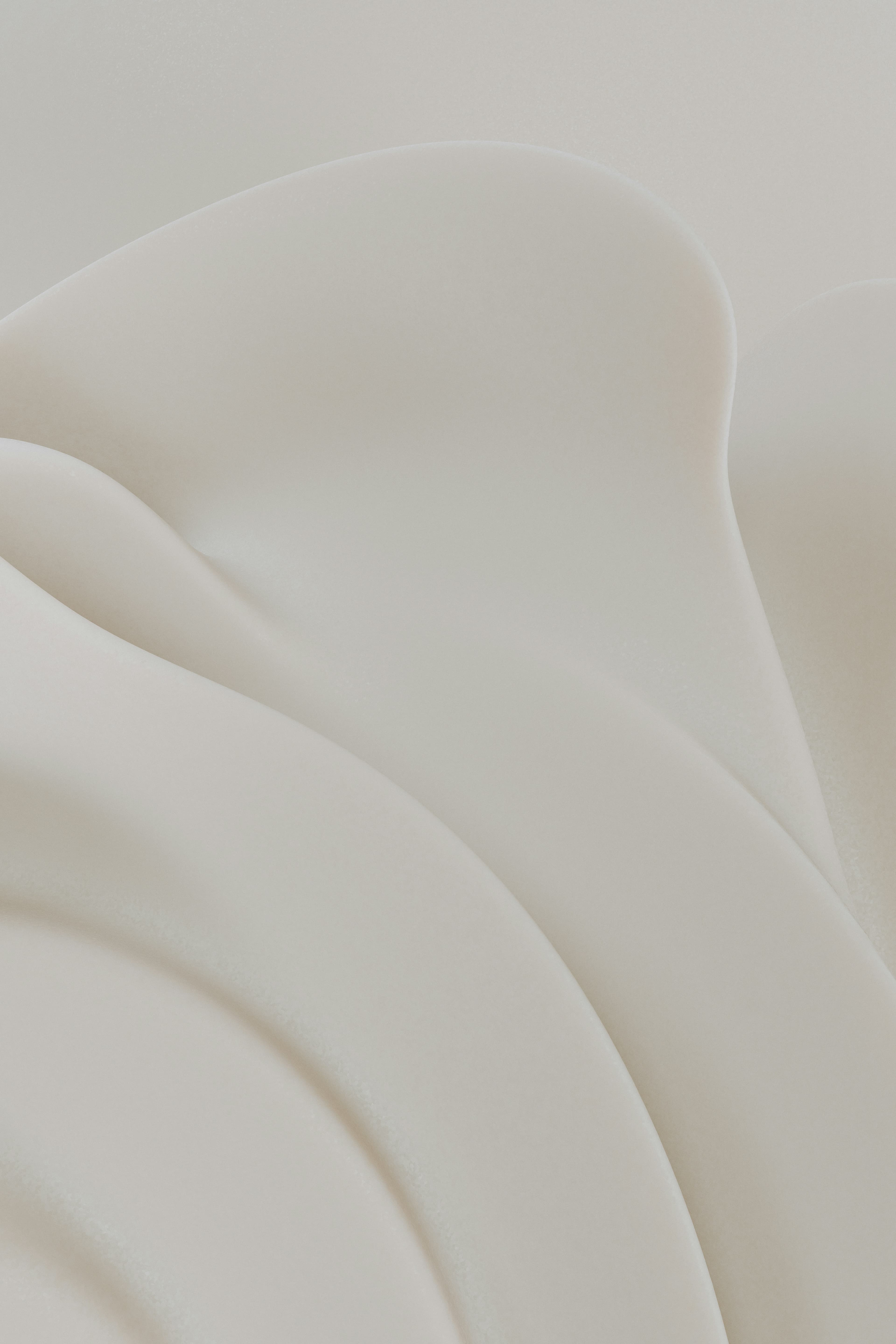 Flowing creamy cosmetic texture forming soft folds